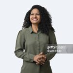 portrait of smiling woman on white background